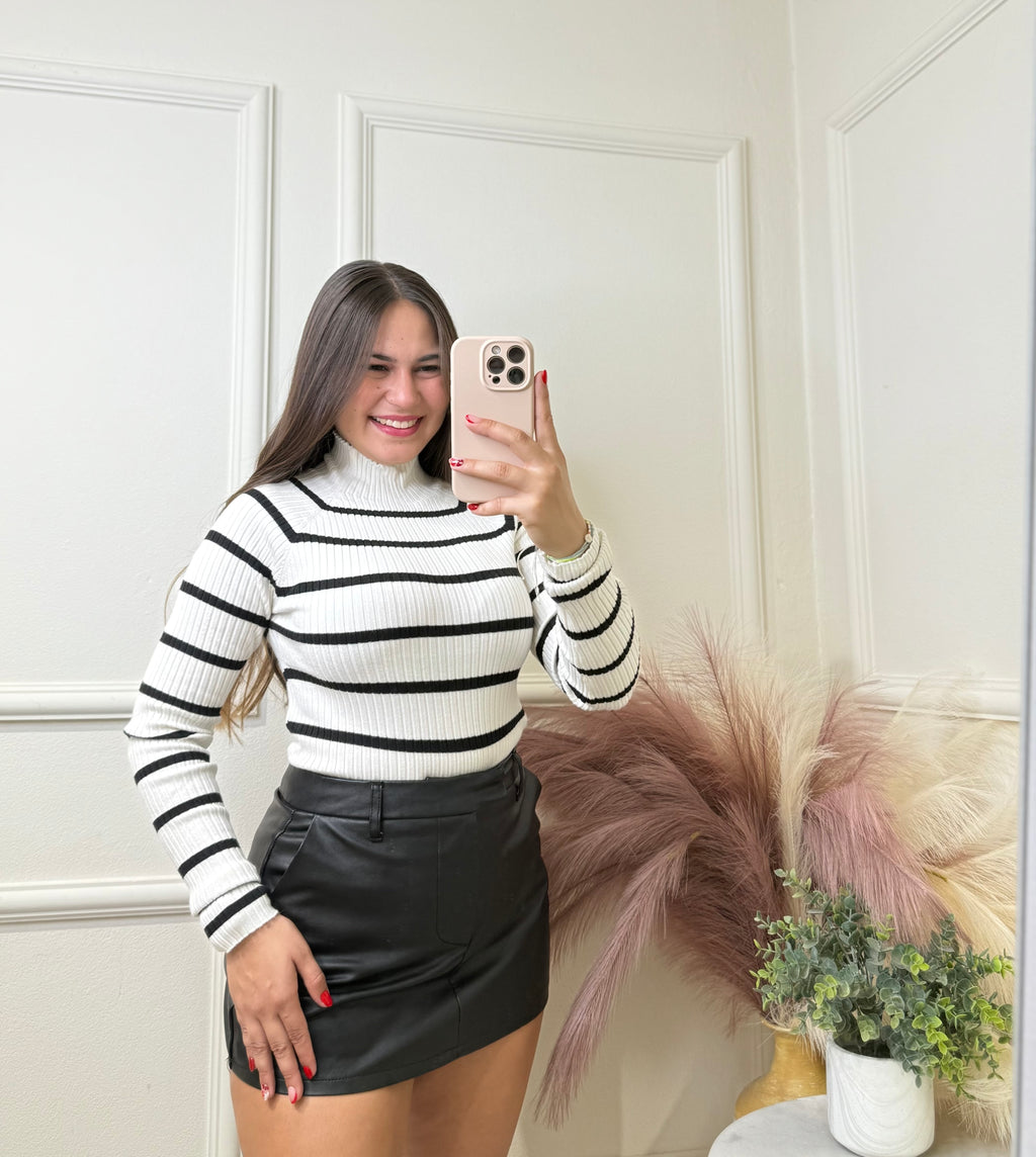 White & black turtle neck blouse